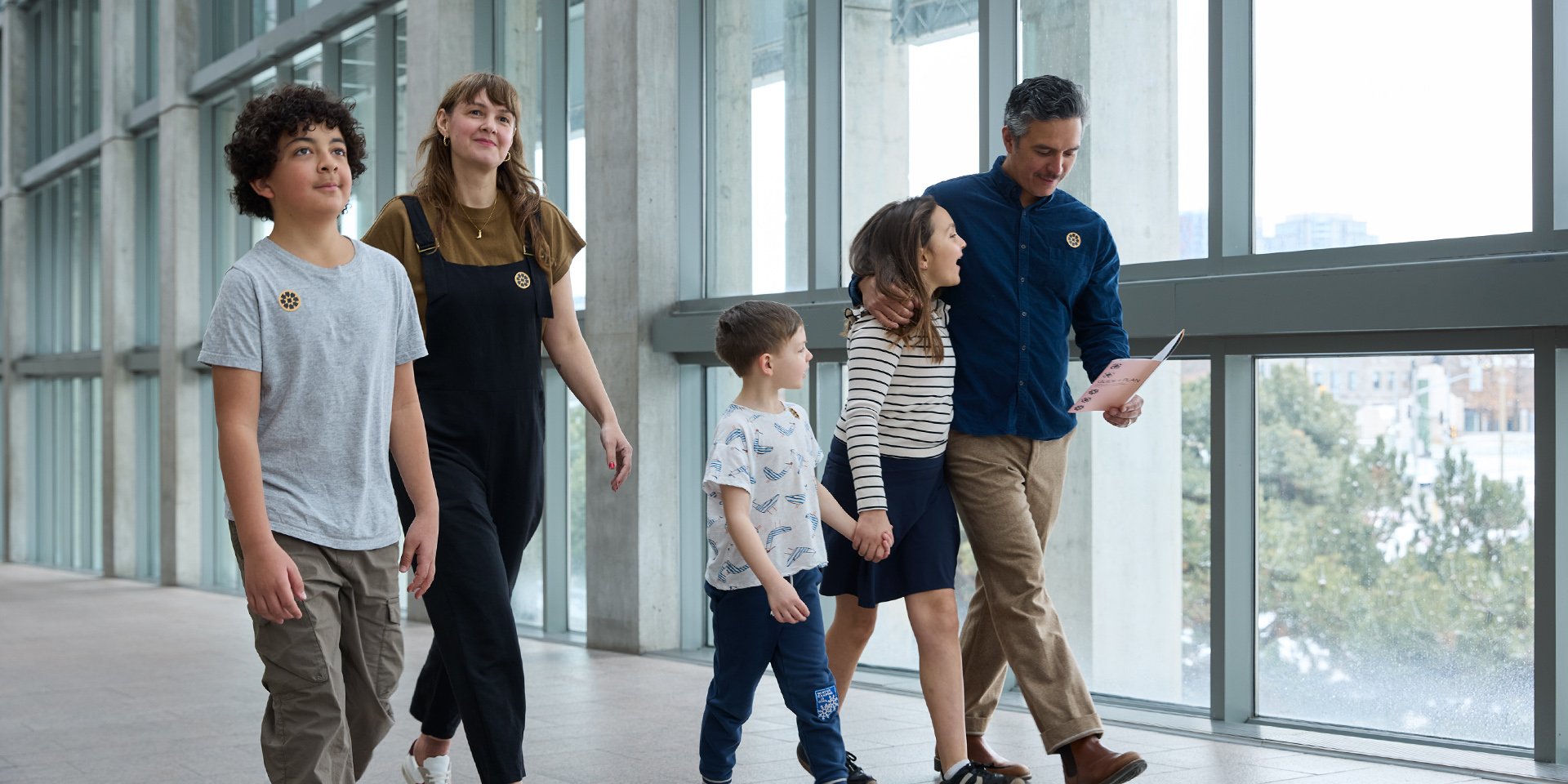 Family walking up the colonnade.