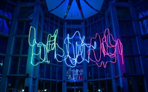 An abstract structure lit up with colours.  